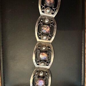 Sterling Silver bracelet with Fire Opal stones.